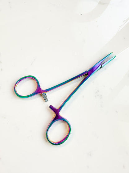 Pinza per piercing piatta