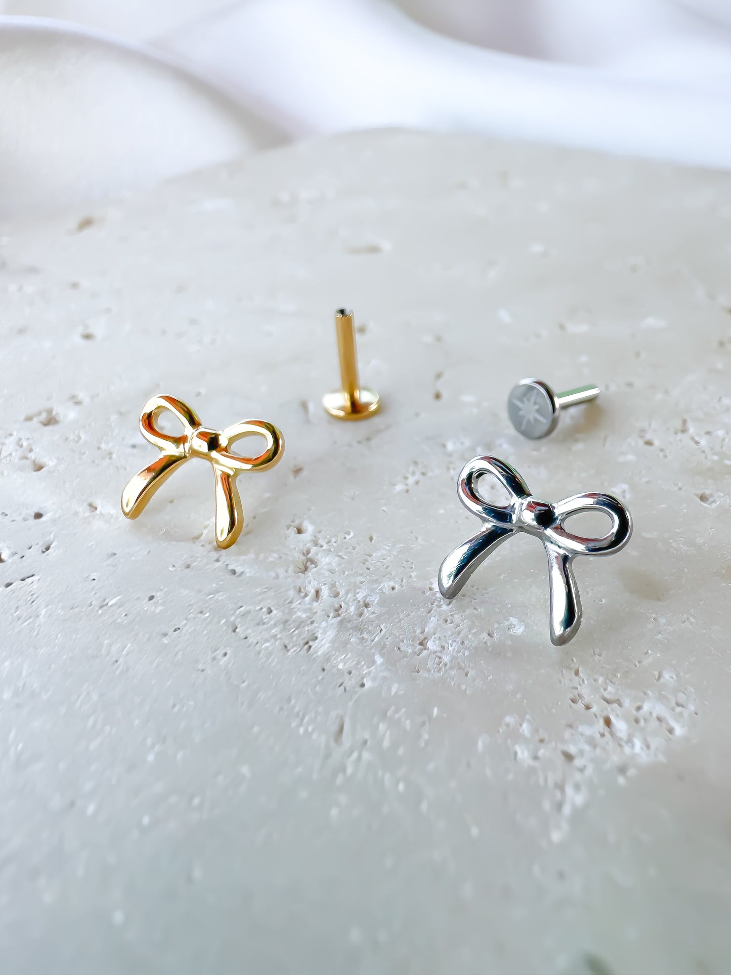 Piercing Bow titanio