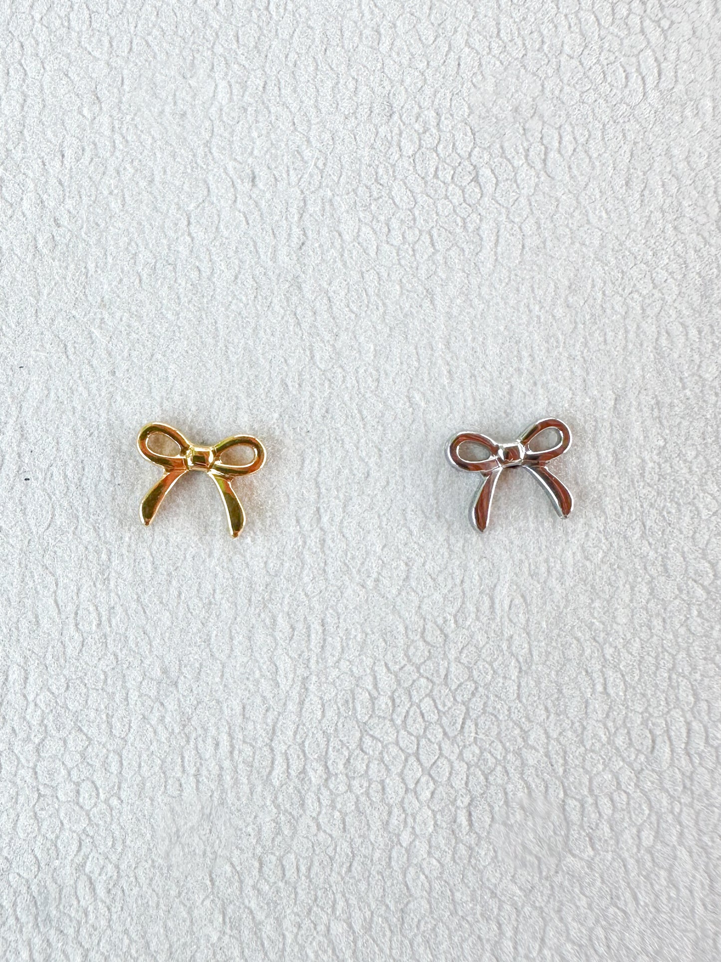 Piercing Bow titanio